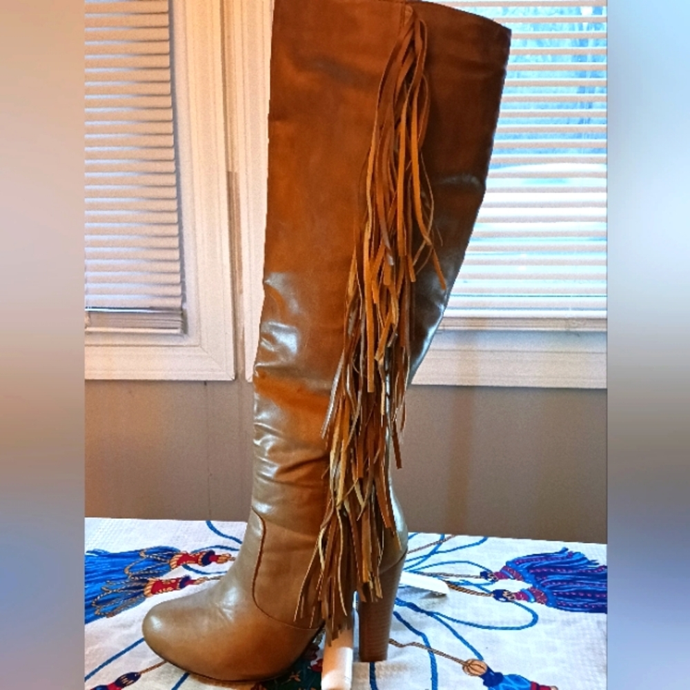 Tan under the knee boots with tassling